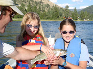 Two Kids with a Fish